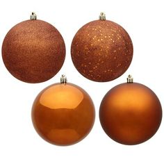 three shiny brown christmas ornaments on white background