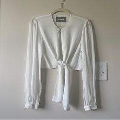 New Without Tag. Bought It A Few Years Ago But Never Worn. Elegant And A Bit Of Retro. Can Be Dressed Up Or Down. Fitted White Blouse With Tie Waist, Elegant Blouse With Tie Sleeves For Brunch, Chic White Blouse With Tie Waist, Elegant White Top With Tie Waist, White Blouse With Tie Sleeves For Brunch, Elegant Blouse With Tie Waist For Brunch, Fitted Tops With Tie Waist For Brunch, Fitted Tie Waist Top For Brunch, Fitted Top With Tie Waist For Brunch