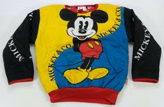 Rare Vintage WALT DISNEY CO. Mickey Mouse Color Block Sweatshirt 80s 90s OSFA 25” - pit to pit 26” - top of back collar to waist 18.5” - pit to wrist flaws -light discoloring spots and blemishes on right arm -light marking on the front of right shoulder -light blemishes and markings around the top and middle of front -light discoloring spots and blemishes at the top of back Thanks for checking out  DasCardHaus! We provide you great deals on sports cards, collectables, records, books, and vintage Throwback Long Sleeve Top With Graphic Print, Vintage Multicolor Tops With Cartoon Print, Fun Mickey Mouse Top For Streetwear, Retro Long Sleeve Tops With Character Print, Fun Mickey Mouse Tops For Streetwear, Vintage Multicolor Top With Cartoon Print, Blue Long Sleeve Top With Mickey Mouse, Retro Cotton Sweatshirt With Cartoon Print, Vintage Long Sleeve Tops With Cartoon Print