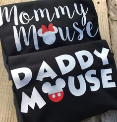 mommy mouse and daddy mouse t - shirts sitting on top of each other