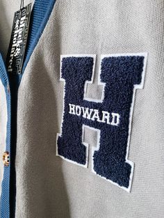 Show your Bison pride with this stylish and comfortable cardigan sweater, perfect for any Howard University enthusiast. Made with the highest quality materials, this sweater is designed to keep you warm and cozy while representing your alma mater or supporting your favorite HU student. Features:- Official Howard University logo embroidered on the chest- Large "H" Chenille patch- Classic cardigan design with a tortoise shell button-up front- Two front pockets (deep enough to fit a phone and other Howard University Outfit, Howard University Aesthetic, College Goals, University Sweater, School Sweater, College Sweater, College Motivation, Varsity Cardigan, College Gear