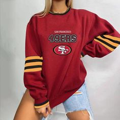 Opt for a classic look with this American Football Sweatshirt!

 This American football logo hoodie is casual and loose . It has a crew neck , striped sleeves , oversized to give a unique and sporty look. It offers a trendy and casual look that adapts to the needs of modern women. Comfortable and with a timeless design, this piece revisits the sporty style with a feminine touch. Treat yourself to this women's hoodie to get a chic and casual look that will accompany you wherever you go!





 Material: Cotton

 12 models available




 High quality finish

 Free Shipping




 ✂ SIZE GUIDE (cm) 












 Size


 Shoulder


 Bust


 Sleeves


 Length 






 S

 43

 106

 59

 67 






 M

 45

 112

 61

 69 






 L

 47

 117

 62

 71 






 XL

 48

 123

 63

 73 






 2XL 49ers Sweatshirt, Sweat Vintage, Chic Sweater, Women's Hoodie, Style Sportif, Jean Vintage, Football Sweatshirt, Cozy Knit Sweater, Chic Sweaters