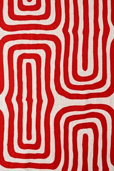 red and white fabric with wavy lines on it