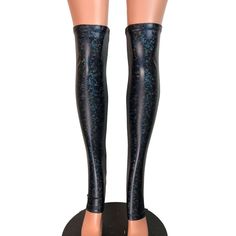 Stunning black shattered glass holographic spandex calf or leg sleeves with stirrup bottoms. These leg warmers come up just over the knee with elastic to hold them in place. The stirrup bottoms are cut perfectly to fit your heels with no seam under your foot. High Stretch Party Leggings For Winter, Black Leg Warmers For Festival, Black Winter Party Leggings, Black Leggings For Winter Party, Black Leggings For Party In Winter, Thigh-high Stretch Leg Warmers For Cosplay, Thigh High Stretch Leg Warmers For Cosplay, Stretch Thigh High Leg Warmers For Cosplay, Fitted Alternative Leggings For Night Out