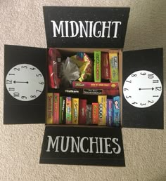 a clock and some candy in a box on the floor with words midnight, munchies