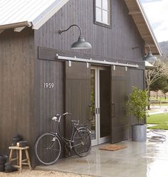 an advertisement for the interior barn door company, which is located in front of a house