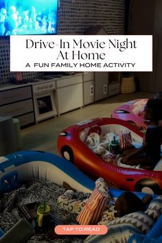 two children are playing in an inflatable pool with the words drive - in movie night at home