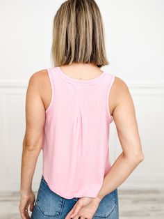 This top has got you covered in comfort and style with its sleeveless design, soft knit material, and swing crop silhouette. Stay cool and trendy all day long! Fabric content: 75% Polyester, 17% Rayon, 8% Spandex Versatile Crop Tank Top For Loungewear, Everyday Sleeveless Stretch Crop Top, Sleeveless Stretch Crop Top For Everyday, Trendy Cropped Tank Top For Layering, Trendy Sleeveless Crop Top For Layering, Everyday Stretch Sleeveless Crop Top, Versatile Cotton Crop Top For Layering, Sleeveless Crop Top For Day Out, Solid Color Sleeveless Crop Top For Day Out