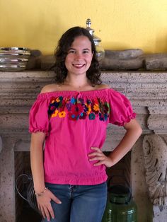 Beautiful Mexican top with floral embroidery, spring in the waist, neck and sleeves, hand embroidered by artisans from Oaxaca, Mx, it is a unique piece to make you look spectacular on any occasion. This blouse comes as a one size ideal for Small and Medium sizes. Blouse made by artisans from Oaxaca, Mx. Mexican textile art has centuries of history and creativity throughout the country. Mexico is recognized as one of the leading countries with a beautiful aristic production in the textile world, Bohemian Short Sleeve Tops For Spring, Casual Embroidered Top With Boho Collar For Spring, Fitted Floral Print Embroidered Top For Summer, Fitted Floral Embroidered Top For Summer, Bohemian Embroidered Summer Top, Bohemian Embroidered Top For Summer, Bohemian Embroidered Short Sleeve Top For Summer, Spring Bohemian Embroidered Short Sleeve Top, Spring Festival Floral Embroidered Top