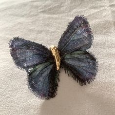 Rare Found Butterfly Brooch With Such An Intricate Design. The Wings Are Handmade Fabric With Elegant Shining String. Must Have If You Want A Unique Touch, Especially Butterfly Is So In Now. Only One Piece. Never Use. Brand New. Materials: Fabric, 18k Plated Gold & Platinum Size: 2 1/4 X 2 In Fast Shipping From Non Smoking Home. Thank You For Your Time. Happy Shopping Live In Art Unique Blue Brooch For Party, Unique Blue Brooches For Party, Blue Brooch Lapel Pin As Gift, Elegant Blue Butterfly Brooches, Handmade Blue Brooches For Party, Handmade Blue Wedding Brooches, Formal Blue Handmade Brooches, Fabric Brooch, Fabric Butterfly