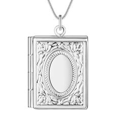 Keep your loved ones close to your heart. This beautiful locket is highly polished sterling silver plating with finely engraved detail. Great gift idea! Perfect for photos or keepsakes. Chain: 18 inch silky snake chain Material: Silver Plated (nickel free) Size: 23mm x 22mm (.90 inches x .75 inch) (Reg $39) Seashell Photo, Book Locket Necklace, Frame Necklace, Man Wedding, Book Locket, Engagement Style, Open Frame, Caicos Islands, Metal Necklaces