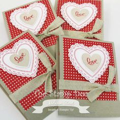 four red and white cards with hearts on them