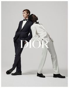 two men in tuxedos pose for dior's spring / summer 2012 campaign