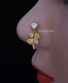 Product Detail : - Material : - 925 Sterling silver, Cubic zirconia gem stone with 14Krt Micron gold plating Nickle free Plating Color : - Gold Stone Color: White (as per Image) Width : - 6 mm Length : - 9 mm Wire Gauge size : - 22 Gauge / 0.62 mm 20 Gauge / 0.80 mm 18 Gauge / 1.00 mm 16 gauge / 1.2 mm Shipping Detail: Processing Time : - 1-2 Working Day Shipping Time : - 15-20 Working days Shipping Service : - USPS,DHL eCommerce,UPS and FedEx. Note :- 1) For Express shipping ( 3-5 Working days Bling Hoop Jewelry For Gifts, Silver Cubic Zirconia Nose Rings For Gift, Dangle Nose Ring, Gold Nose Ring, Gold Nose Stud, Indian Nose Ring, Wire Gauge, Gold Nose Rings, Nose Hoop