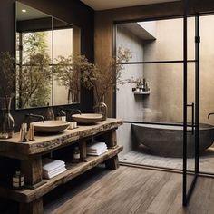 a large bathroom with two sinks and a bathtub in the center, along with a walk - in shower