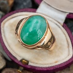 This handsome vintage mens ring is bezel set with an oval cabochon jadeite jade. The ring is crafted in 10k yellow gold with a nice patina and is currently a size 10. Vintage Oval Jade Emerald Ring, Green Oval Signet Ring Collectible, Vintage 14k Gold Oval Cabochon Emerald Ring, Vintage 14k Gold Emerald Oval Cabochon Ring, Antique Oval Emerald Ring, Vintage Green Signet Ring With Polished Finish, Vintage Polished Emerald Ring With Oval Cabochon, Vintage Oval Cabochon Emerald Ring With Polished Finish, Vintage Emerald Oval Cabochon Ring With Polished Finish