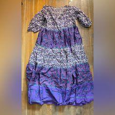 This Is A Gorgeous Natural Life Dress In Medium. It’s Purple And It’s Some Tan, Pink, And Teal, Looks Amazing On Its Own Or As A Swimsuit Cover Up. I Had Visions Of Wearing It With A Denim Jacket, Hoop Earrings And Flip Flops But I’m Too Short. I’m 5’ And The Dress Hits Me At The Tops Of My Feet, I Have To Hold The Dress Up If I’m Walking Up/Down Stairs So I Don’t Trip. It’s Beautiful Though! For The Record, I Only Tried This On, It’s Brand New, The Tag Came Off When I Tried It On. Smoke Free Ho Purple Cotton Printed Dresses, Printed Cotton Purple Dresses, Purple Printed Cotton Dress, Purple Cotton Beach Dress, Purple Floral Print Tunic Dress, Purple Flowy Tunic Dress, Purple Bohemian Tunic Dress, Bohemian Purple Tunic Dress, Purple Boho Print Dress For Festivals