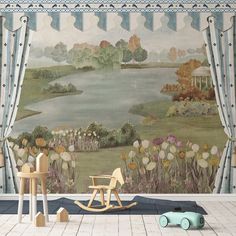 a child's room with a large mural on the wall