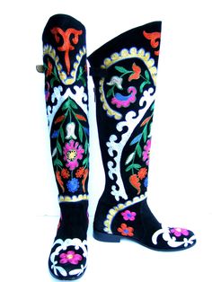 "Exotic embroidered boho style black suede floral boots Size 38 The dramatic suede embroidered floral boots are designed with elaborate floral designs in a myriad of vibrant eye-catching colors The stylish boots zipper up the backside with a buckle tab closure The interior of the boots are lined in soft tan leather Designed by Zeggani On Sale Reduced from $350 dollars Stamped Size 38 The tallest height from the top front of the boots opening to the base of the soles = 21\" inches Very Nice pre-o Floral Boots, Vibrant Eyes, Stylish Boots, Leather Design, Boot Shoes Women, Floral Designs, Tan Leather, Rubber Rain Boots, Black Suede