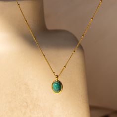 N A T U R A L ∙ T U R Q U O I S E ∙ N E C K L A C E Our Natural Turquoise Necklace features a stunning Turquoise Oval pendant on a delicate Satellite chain, perfect for a boho-chic summer vibe. Add a splash of color and a free-spirited touch to your sunny day outfits with this radiant piece! * Material: High Quality Solid 925 Sterling Silver  * Finish: Sterling Silver ∙ 18K Gold  * Featuring ~12x10mm Natural Turquoise Gemstone Pendant on a dainty Satellite Chain, adjustable from 16 to 18 inches. Gold Minimalist Turquoise Necklace Gift, Minimalist Gold Turquoise Necklace, Green Minimalist Tarnish-resistant Necklace, Initial Tag Necklace, Dainty Initial Necklace, Diamond Huggies, Turquoise Pendant Necklace, Crystal Pendant Necklace, Crystal Necklace Pendant