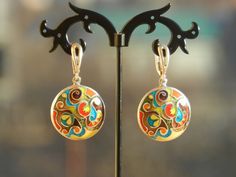 This Dangle & Drop Earrings item by CloisonneEnamelShop has 34 favorites from Etsy shoppers. Ships from Georgia. Listed on May 30, 2023 Multicolor Enamel Earrings, Colorful Round Earrings Gift, Colorful Round Earrings For Gift, Artistic Enamel Jewelry With Matching Earrings, Artistic Enamel Drop Earrings, Artistic Enamel Jewelry With Earrings, Artistic Design Enamel Drop Earrings, Fusion Style Artistic Earrings For Gift, Silver Painted Drop Earrings