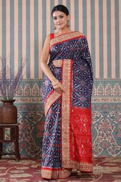 Shop blue Patola silk sari online in USA with red embroidered border. Make a fashion statement at weddings with stunning designer sarees, embroidered sarees with blouse, wedding sarees, handloom sarees from Pure Elegance Indian fashion store in USA.-full view Patola Silk Saree, Fashion Journals, Embroidered Border, Traditional Fabric, Handloom Saree, Blouse Dress, Saree Wedding, Blouse Piece, Beautiful Blue