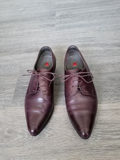 "Vintage oxblood dark red lace up shoes. Leather women`s flat oxfords with pointy toes. Size 7 UK.  Leather lining.  Brand: Hōgl (As an Austrian family company with a history of just under 90 years). condition: good, have some scratches and streaks on the back leather - photo No.10. Normal used vintage shoes. Look at the photos, please. measurements: Heels height 3 cm / 1.2\" in  Outsole length 31 cm / 12.1\" in bottom sole width in widest place 9,1 cm / 3.5\" in  SIZE:  UK 7 (labeled), eu 40 1/ Fitted Pointed Toe Oxfords With Rubber Sole, Form-fitting Pointed Toe Oxfords With Rubber Sole, Fitted Pointed Toe Oxfords For Derby, Formal Flat Heel Oxfords With Brogue Detailing, Formal Leather Shoes With Red Sole And Pointed Toe, Business Lace-up Dress Shoes With Red Sole, Elegant Fall Oxfords With Laces, Fitted Pointed Toe Oxfords For Business Casual, Business Leather Shoes With Red Sole And Pointed Toe