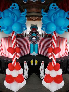 an airplane decorated with red, white and blue balloons