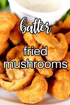 fried mushrooms on a plate with ranch dip in the background and text overlay that reads, better fried mushrooms