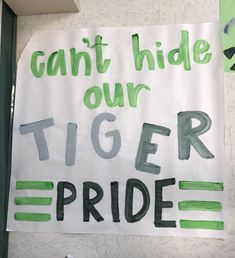 a sign that says can't hide our tiger pride