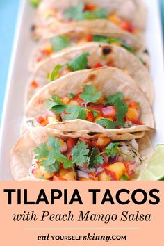 there are many tacos on the plate with cilantro and pineapple salsa