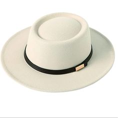 Vintage Style Wide Brim Wool Felt Panama/Fedora Jazz Hat With Belt. * Color:Beige *Size: Medium Circumstance 22.6” 22”-22.8” 7 1/8-7 1/4 Size; Brim 2.9” * 65% Polyester, 35% Wool * Buckle Closure Adjustable Cream Fedora Felt Hat, Adjustable Cream Fedora With Flat Brim, Cream Adjustable Flat Brim Fedora, Cream Adjustable Fedora For Winter, Adjustable Cream Fedora For Winter, Adjustable Cream Winter Felt Hat, Adjustable Wide Brim Beige Top Hat, Adjustable Cream Felt Hat For Spring, Adjustable Beige Felt Hat For Spring