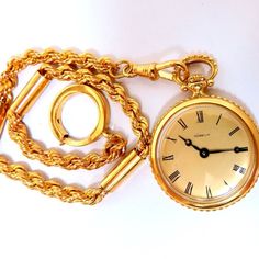 Gueblin Winding Pocket Watch Working And Tested 14kt. Yellow Gold 31.5 Grams. 30mm Diameter Total Length 12 Inches 4mm Caliber Chain Classic Gold Chain Watch, Timeless Yellow Jewelry For Formal Occasions, Timeless Gold Watch With Chain Detail, Timeless Gold Watch With Chain, Gold Timeless Watch With Chain Detail, Yellow Gold Round Pocket Watch For Evenings, Yellow Gold Round Pocket Watch For Evening, Timeless Gold Chain Watch, Formal Gold Chain Watch