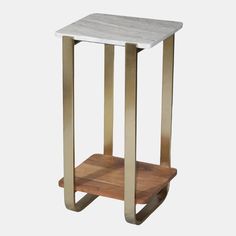 a white marble and gold metal side table