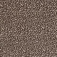 a brown and white animal print fabric