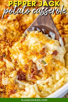 a casserole dish with cheese and other toppings in a white bowl on a wooden spoon