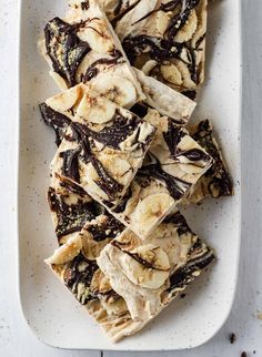 sliced bananas and chocolate on a white plate