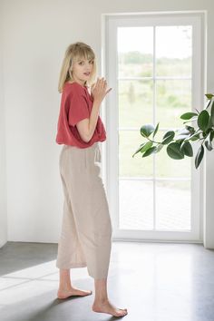 "Comfortable and lightweight linen pants REIMS fit perfectly to each figure and body type. DETAILS: <> Made from OEKO-TEX® certified 100 % European linen; <> Color in the picture: Beige; <> Linen pants REIMS with elastic waistband; <> Pants with two pockets; <> Model is wearing S size; Pants length: Outseam ± 88 cm / 34.7\", Inseam ± 62 cm / 24.4\"; <> Model height 183 cm / 6′; <> Product is made with family love. The quality of linen fabrics and product Relaxed Linen Trousers, Relaxed Flax-colored Straight Pants, Ankle-length Linen Loungewear Bottoms, Relaxed Flax Colored Straight Pants, Relaxed Straight Flax Pants, Linen Tapered Leg Pants For Loungewear, Relaxed Fit Linen Trousers, Relaxed Fit Flax Pants, Relaxed Ankle-length Linen Pants