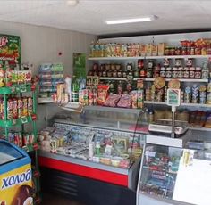 the inside of a grocery store filled with lots of food