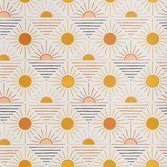 an orange and yellow wallpaper with small sun designs on the top, in front of a white background