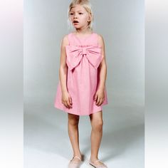 Round Neck Sleeveless Dress Back Button Closure Pink 9-12 Months Spring Sleeveless Dress With Bow For Dress-up, Pink Sundress For Summer Playwear, Playful Sleeveless Dress With Bow, Sleeveless Sundress For Spring Playdate, Spring Playtime Dress With Bow, Casual Sleeveless Dress With Bow, Sleeveless Cotton Dress With Bow, Sleeveless Summer Playwear Dress, Beach Cotton Dress With Bow