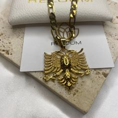 Elevate Your Style with ReluumJewellery's Country Map Pendant Necklaces: Embrace the pride and heritage of Albania with our eagle pendant necklace - a symbol of strength and resilience. Skillfully crafted, this pendant features the majestic Albanian eagle, revered as a national symbol. Whether you're Albanian-born or simply admire its significance, this necklace is a stylish expression of connection and admiration. 🌍 Embrace the world in style with ReluumJewellery's Country Map Pendant Necklace Regal Gold Jewelry For Anniversary, Regal Gold Necklace For Gift, Regal Gold Jewelry For Formal Occasion, Traditional 14k Stamped Medallion Necklace, Traditional 14k Stamped Pendant Necklace, Ceremonial Heirloom Gold Plated Jewelry, Ceremonial Gold Tarnish Resistant Jewelry, Heirloom Gold Plated Jewelry For Ceremonial Occasions, Regal Gold Jewelry For Ceremonies