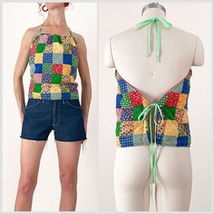 a woman's top made out of patchwork material and tied up to a mannequin