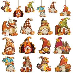 many different types of stuffed animals hanging from clothes pins on strings with pumpkins and other decorations around them