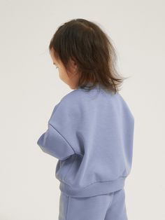 Kids everywhere are loving it. Super soft and ultra-functional, our Cubby Sweater for Kids has a unique fuzzy fleece lining, even in the sleeves and pockets.    Made with premium fabric you won't find anywhere else. Lined with a special fuzzy texture that is softer and more luxurious than regular fleece.  Washed and tested 40x for pilling, shrinkage, and color fade. Hidden functional pockets lined with super soft fuzz. Developed, improved, and tested for comfort for over 2 years. Guaranteed all-day comfort with the right size. Casual, loose, and ultra-cozy fit, perfect for kids.  Materials: 64% Cotton 32% Polyester 4% Spandex Fall Fleece Jacket With Side Pockets, Casual Cozy Fit Sweater With Pockets, Solid Sweatshirt With Soft Texture For Everyday, Everyday Solid Sweatshirt With Soft Texture, Casual Fleece Sweater With Pockets, Everyday Solid Color Sweatshirt With Soft Texture, Soft Textured Everyday Sweatshirt, Solid Sweater With Pockets For Layering, Comfortable Spring Outerwear With Pockets