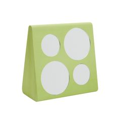 a green paper bag with four white circles on the front and two black dots on the back