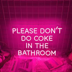 a pink neon sign that says, please don't do cake in the bathroom