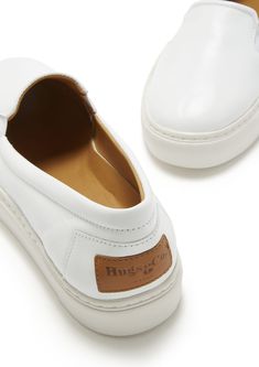 Slip-on contemporary style sneakers for women in white leather by Hugs & Co. Ultimately comfortable sneakers with a white leather upper and crisp white Vibram sole. Featuring our signature full leather lining for luxurious comfort and long lasting shape. Made in Portugal 100% Leather Upper featuring a 100% Leather Lining Rubber sneaker sole by Vibram White Classic Slip-on Sneakers With Round Toe, White Slip-on Sneakers With Stitched Sole, White Leather Slip-on Sneakers With Branded Insole, Classic White Slip-on Sneakers With Textured Sole, White Classic Round Toe Slip-on Sneakers, Classic White Slip-on Sneakers With Round Toe, White Leather Slip-on Sneakers With Round Toe, Modern White Slip-on Sneakers With Contrast Sole, White Leather Slip-on Sneakers