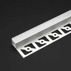 the numbers are written in black and white on a metal strip that has been cut into smaller letters