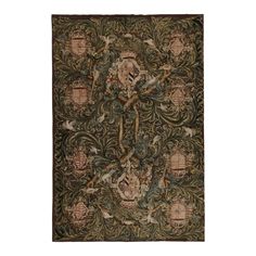 an intricately designed rug with birds and flowers